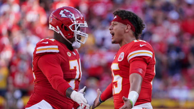 Sep 24, 2023; Kansas City, Missouri, USA; Kansas City Chiefs quarterback Patrick Mahomes (15) congratulates Kansas City Chiefs offensive tackle Jawaan Taylor (74) after a score during the first half at GEHA Field at Arrowhead Stadium. Mandatory Credit: Denny Medley-USA TODAY Sports